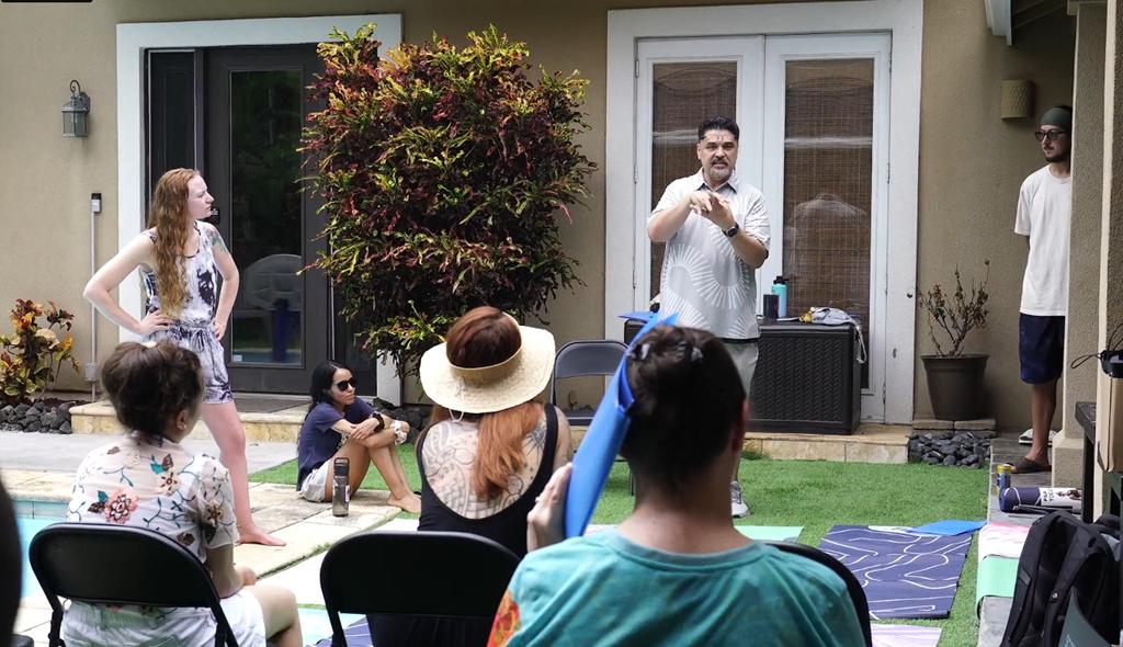 Healing Heroes Hawaii retreat: outdoor group session in a lush Kona setting