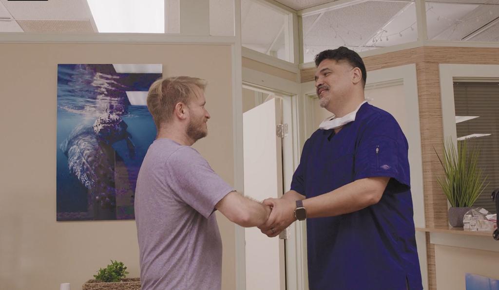 Healing Heroes Hawaii: a warm handshake between a participant and a care provider